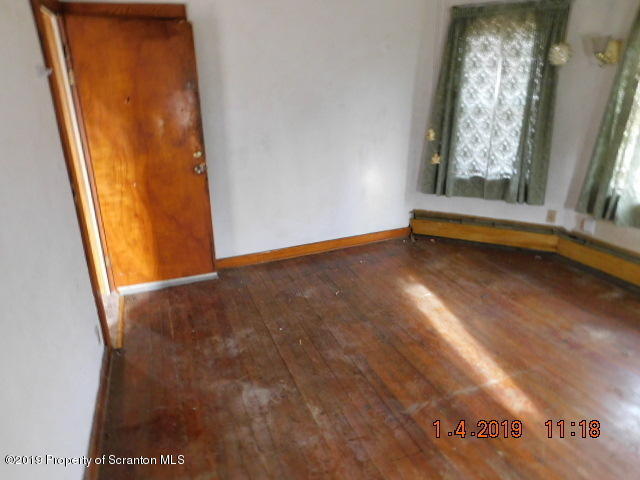 1693 Cortez Road Waymart, PA 18472 - Photo 20 of 29 a view of an empty room with a window