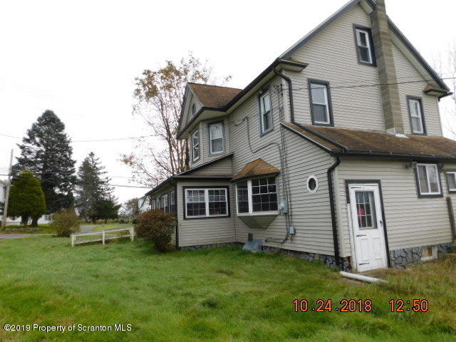 1693 Cortez Road Waymart, PA 18472 - Photo 2 of 29 a view of a house with a yard