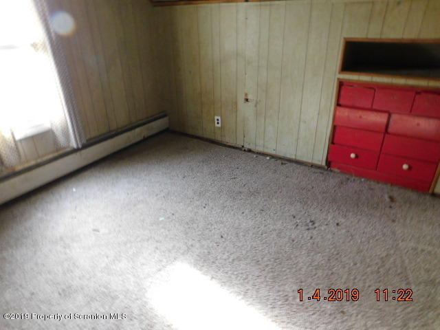 1693 Cortez Road Waymart, PA 18472 - Photo 25 of 29 a view of a room with wooden floor and windows