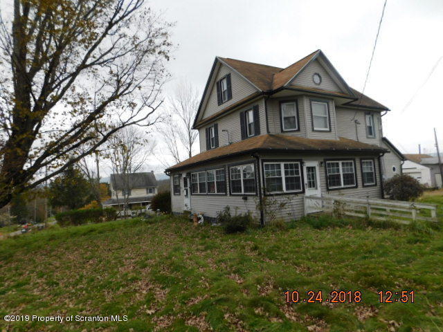 1693 Cortez Road Waymart, PA 18472 - Photo 4 of 29 a view of a house with a yard