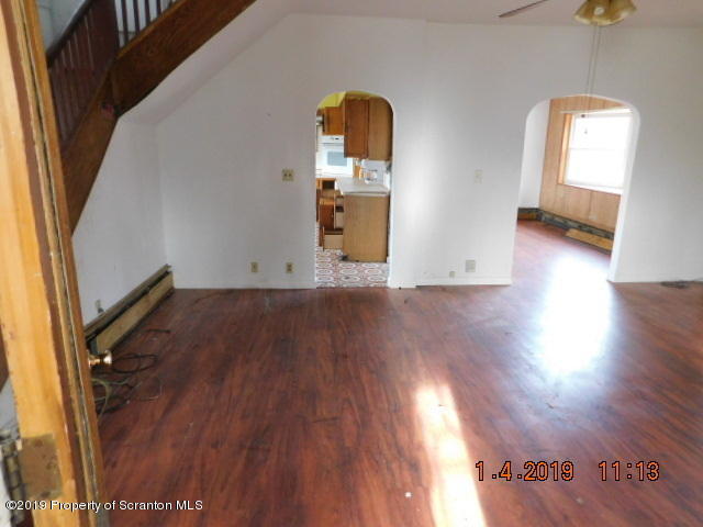 1693 Cortez Road Waymart, PA 18472 - Photo 8 of 29 a view of empty room with wooden floor and fan