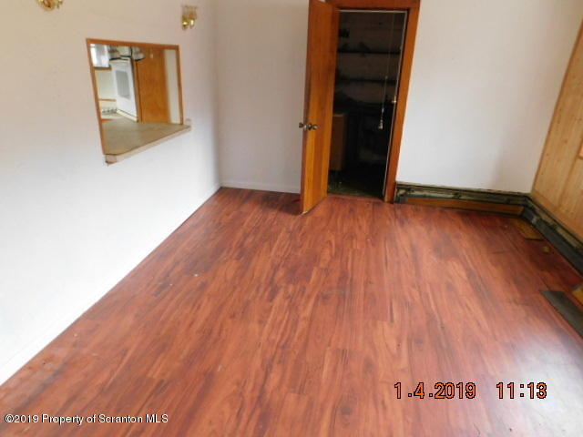 1693 Cortez Road Waymart, PA 18472 - Photo 10 of 29 a view of an empty room with wooden floor