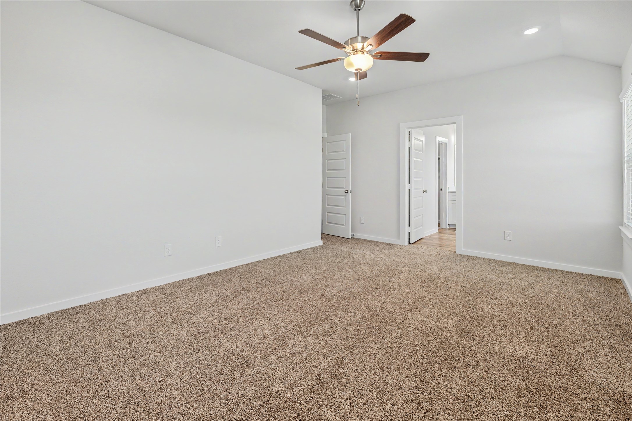 6427 Bolinas Court Rosharon, TX 77583 - Photo 36 of 49 an empty room with a ceiling fan and a window