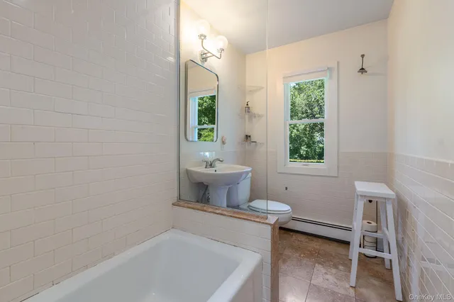 a bathroom with a sink and a bathtub