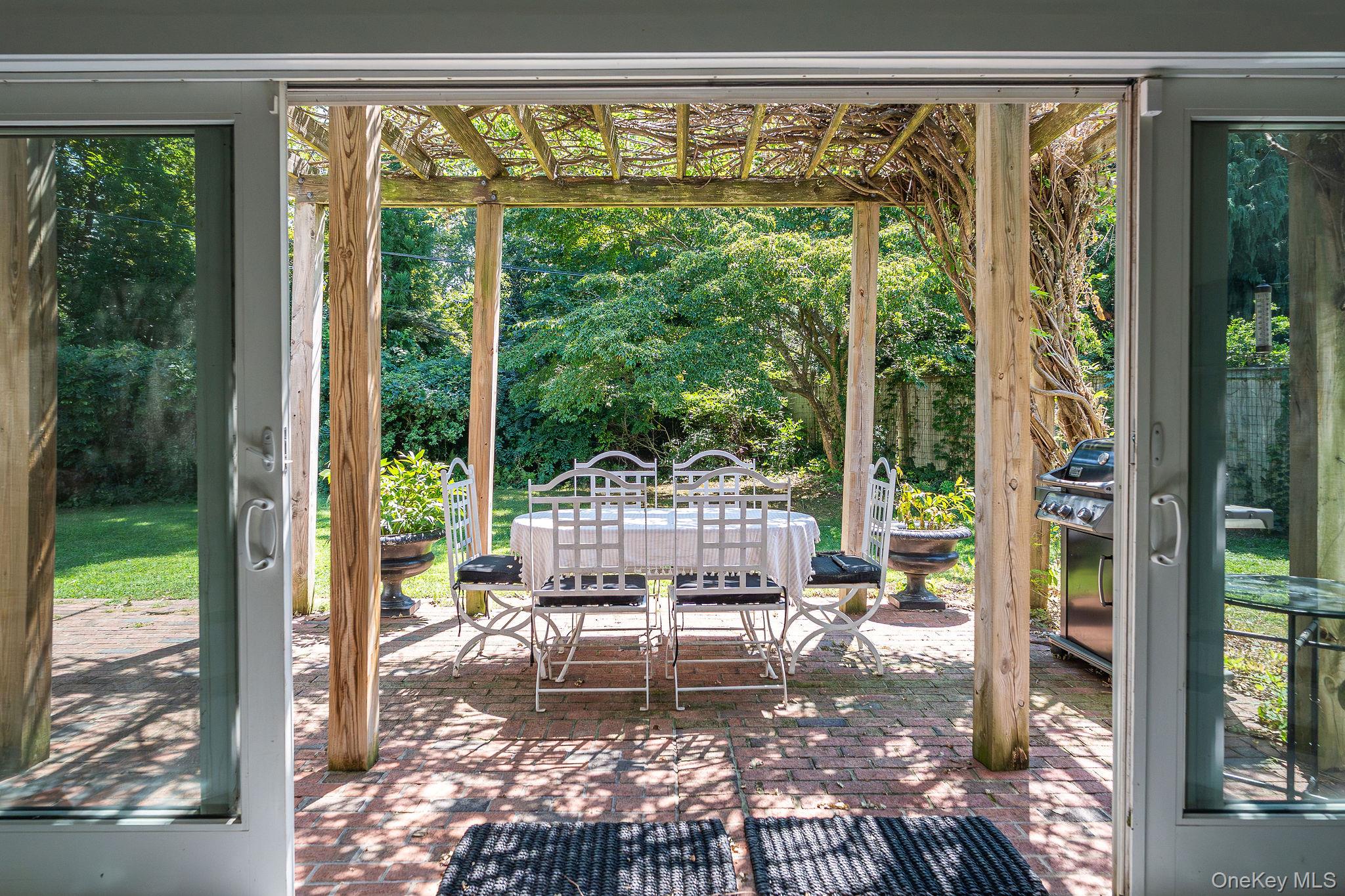 1 Gazon Road Shelter Island, NY 11964 - Photo 26 of 35 a living room with hardwood floor and a large window