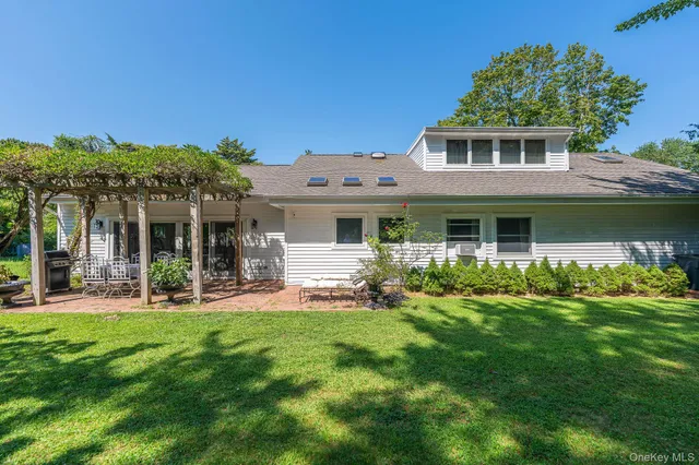 front view of a house with a garden
