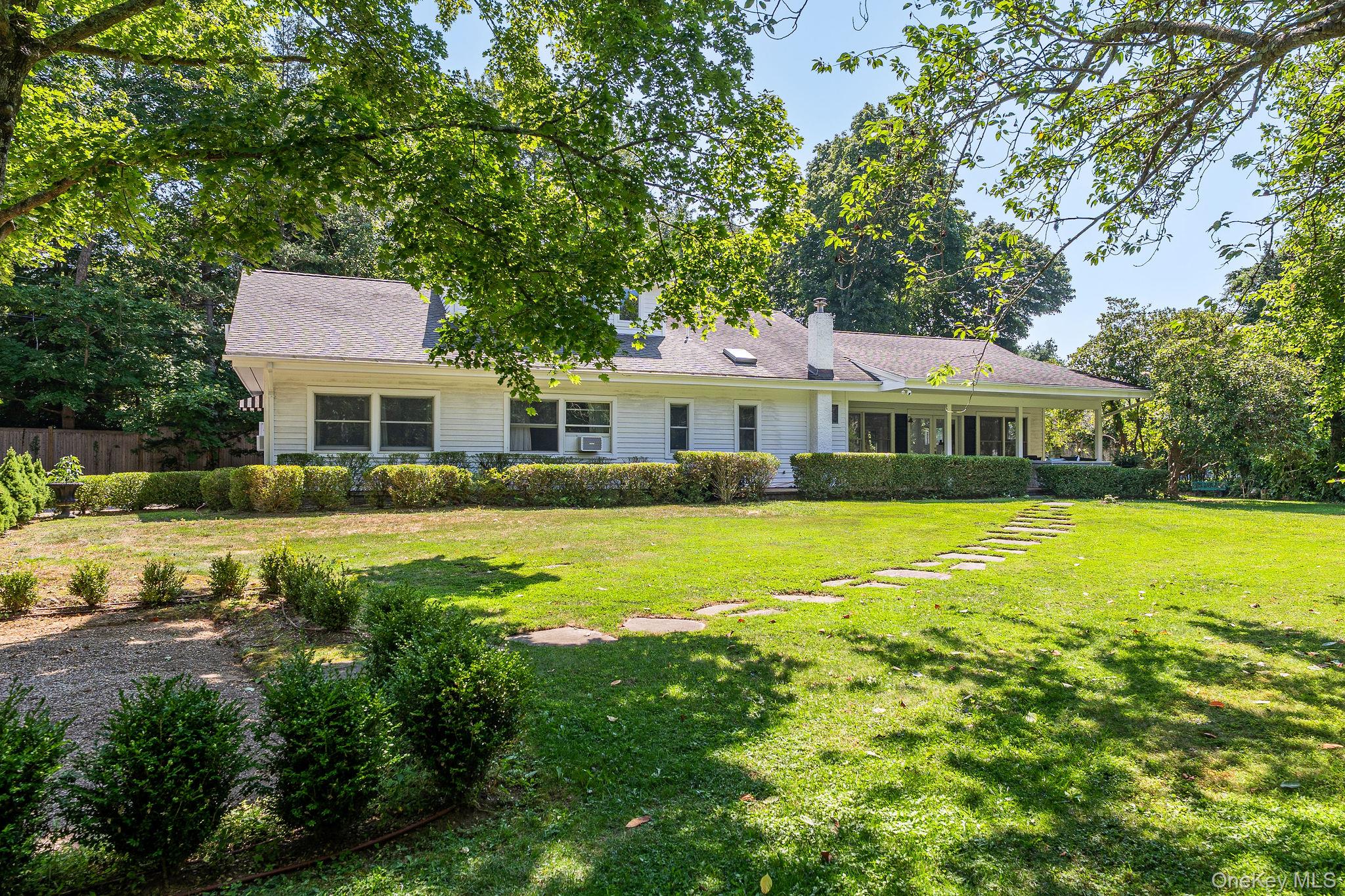 1 Gazon Road Shelter Island, NY 11964 - Photo 30 of 35 a front view of a house with swimming pool having outdoor seating