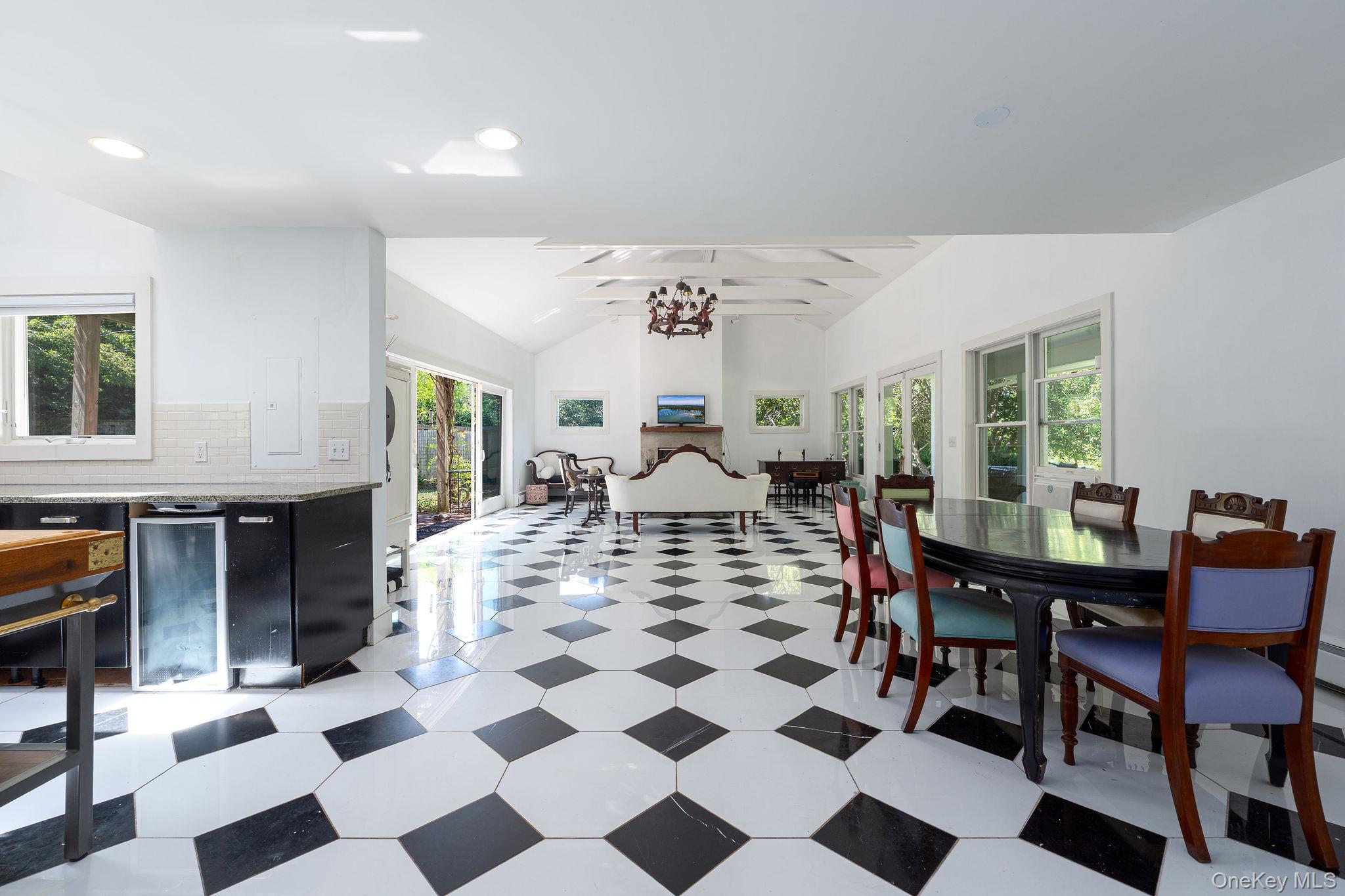 1 Gazon Road Shelter Island, NY 11964 - Photo 7 of 35 a view of a livingroom with furniture a rug and a fireplace