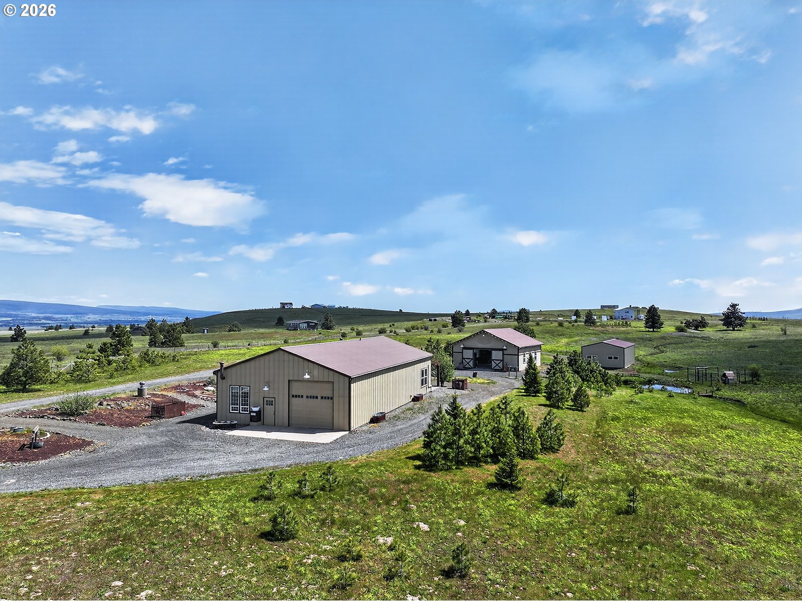 250 Schilling Road Lyle, WA 98635 - Photo 2 of 46 an aerial view of residential house with outdoor space