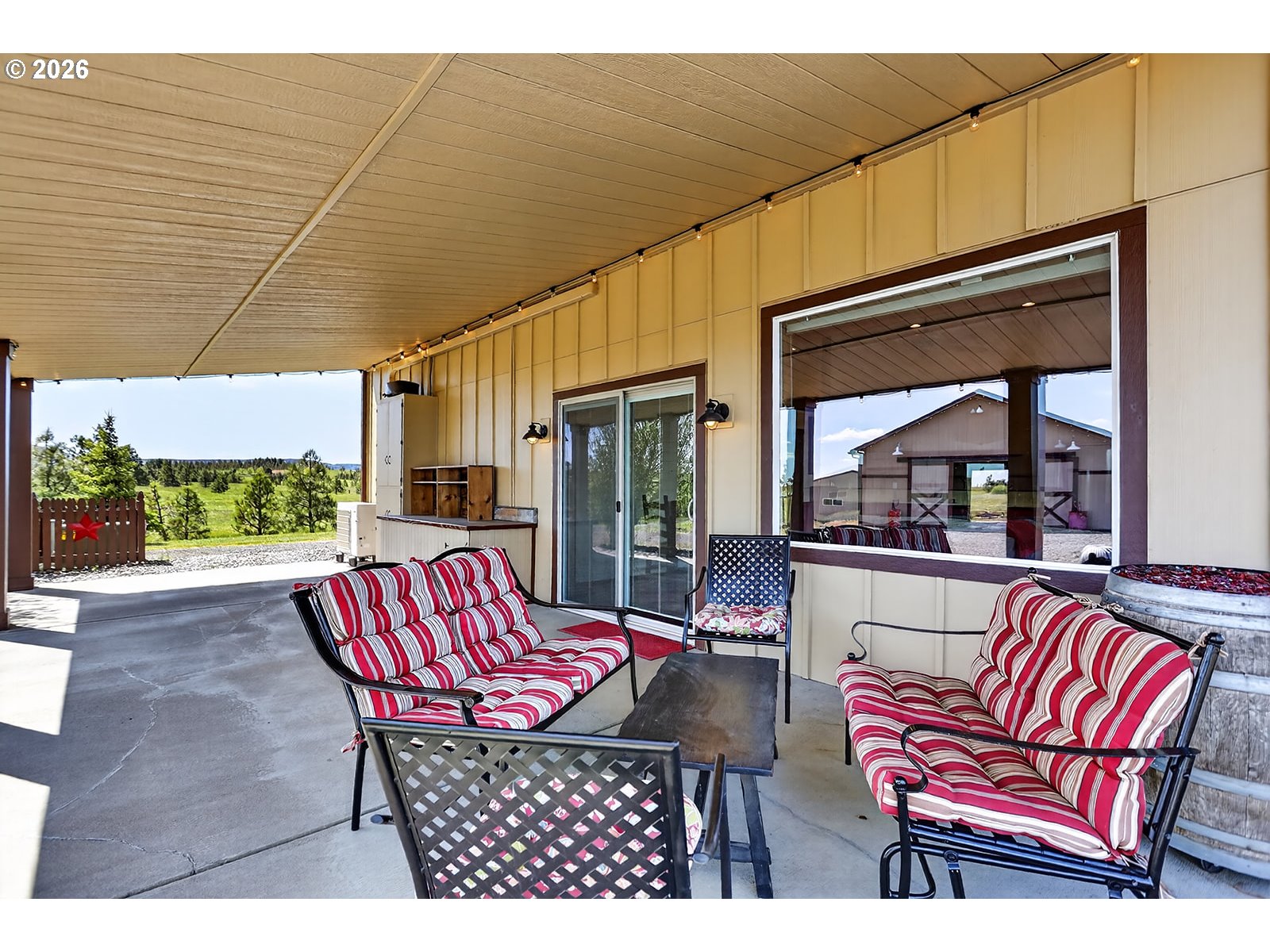 250 Schilling Road Lyle, WA 98635 - Photo 28 of 46 a outdoor living space with patio furniture and a potted plant