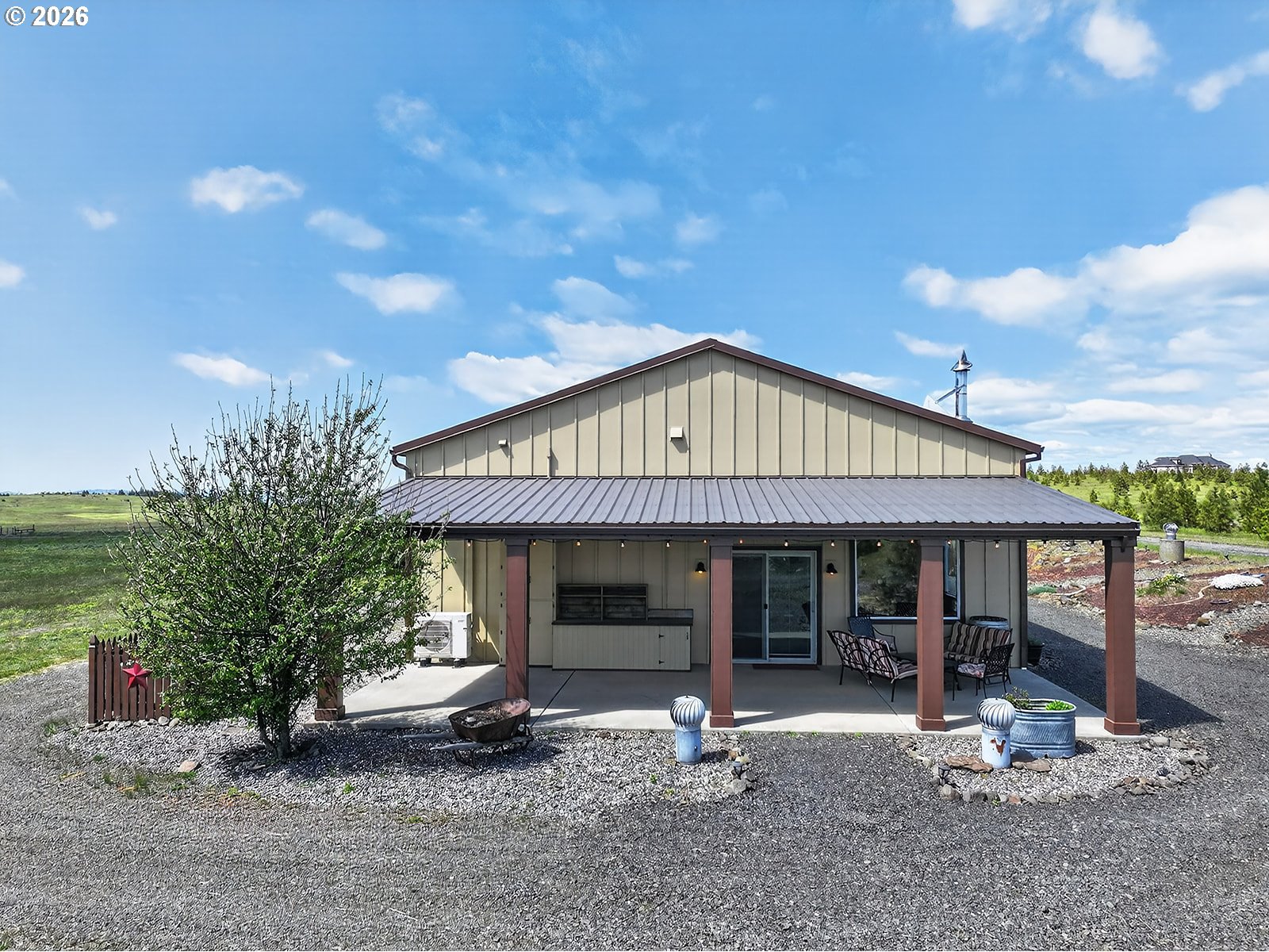 250 Schilling Road Lyle, WA 98635 - Photo 29 of 46 a front view of a house with garden