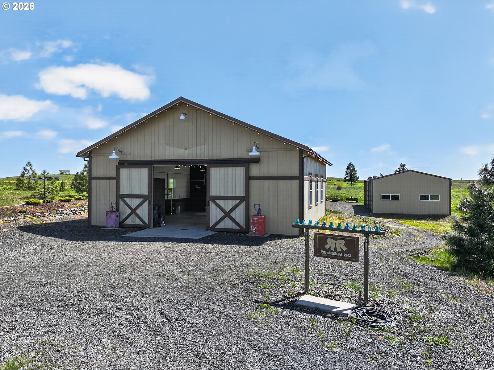 250 Schilling Road Lyle, WA 98635 - Photo 31 of 46 a view of a house with a yard