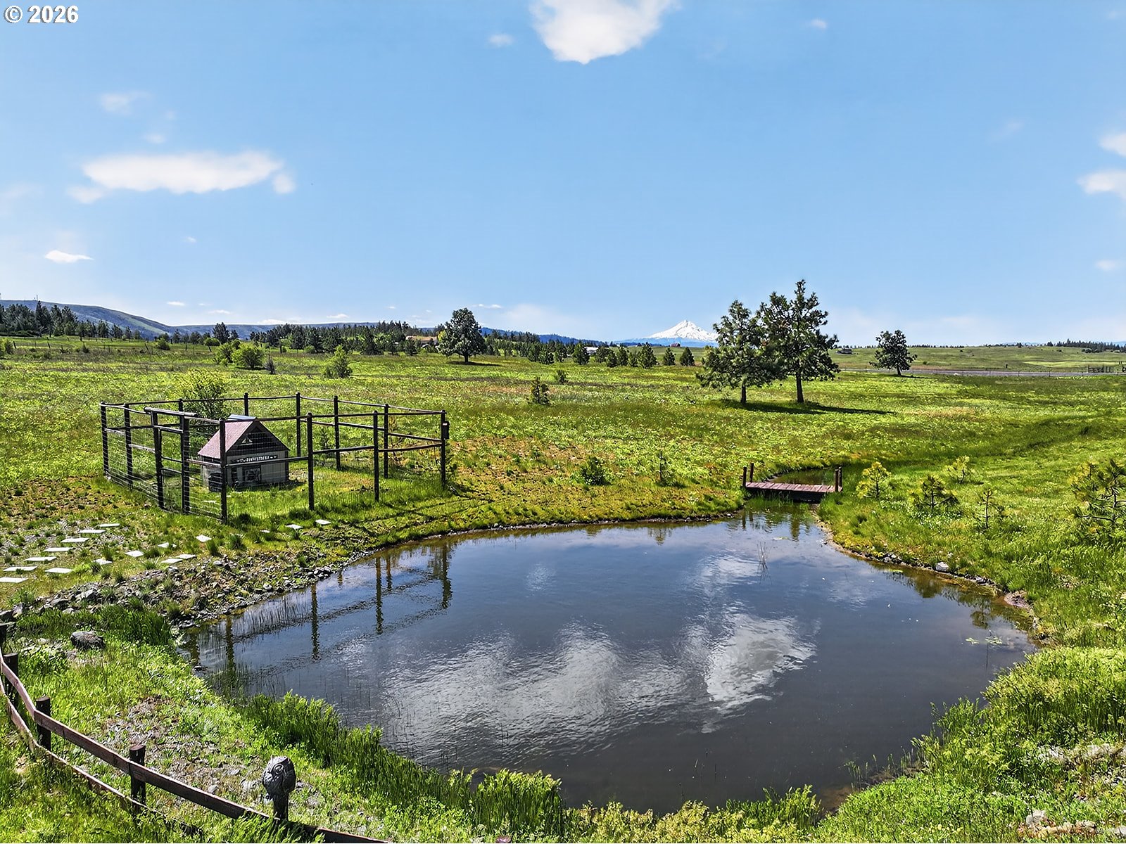 250 Schilling Road Lyle, WA 98635 - Photo 38 of 46 a view of a lake with a big yard