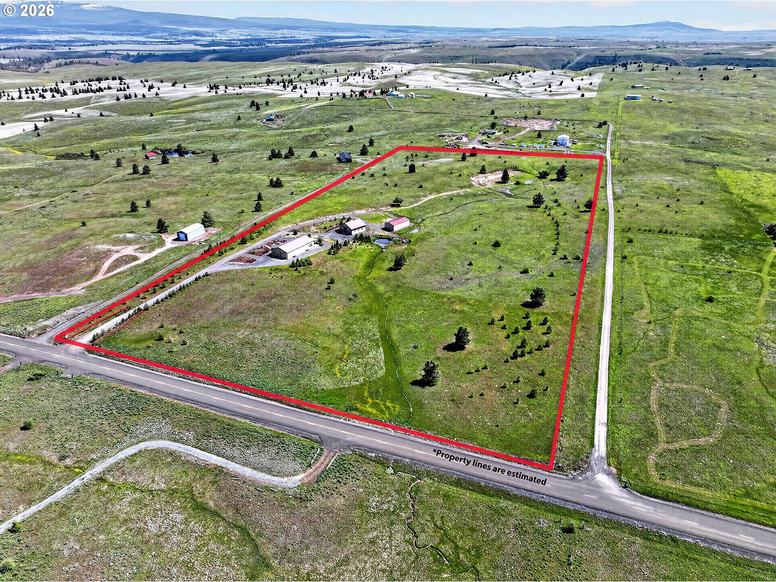 250 Schilling Road Lyle, WA 98635 - Photo 42 of 46 a view of a field with an outdoor space