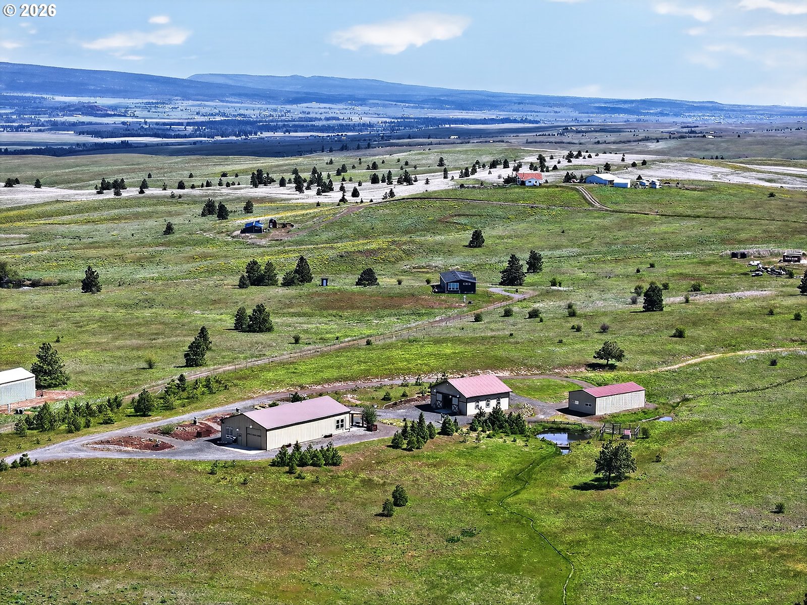 250 Schilling Road Lyle, WA 98635 - Photo 43 of 46 a backyard of a house with a yard and lake view