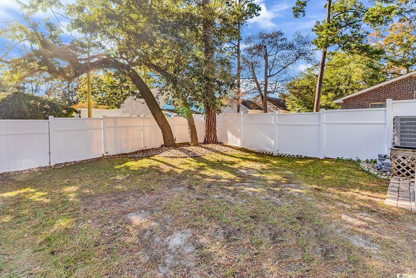 327-a&b Sparrow Drive Surfside Beach, SC 29575 - Photo 18 of 33 View of fenced backyard
