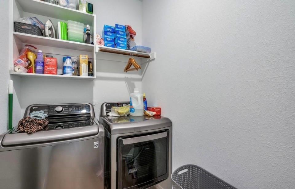 8424 Gray Squirrel Ln. McKinney, TX 75071 - Photo 12 of 22 a room with storage and utility