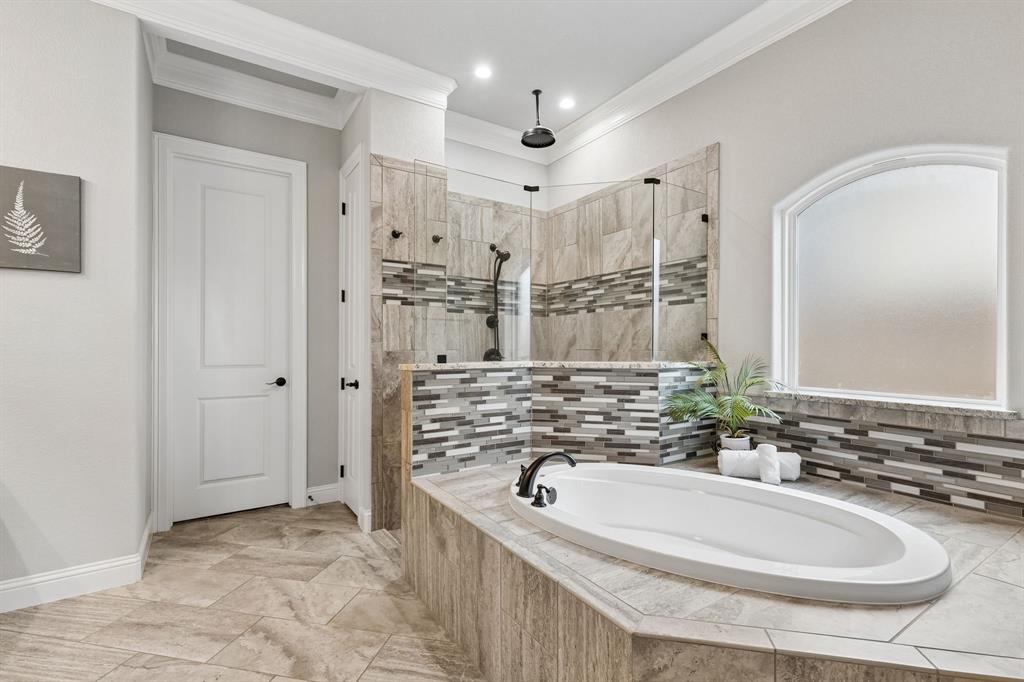 104 Ryder Court Hurst, TX 76053 - Photo 20 of 35 Spa-Like Bath With Deep Soaking Tub And Frameless Shower