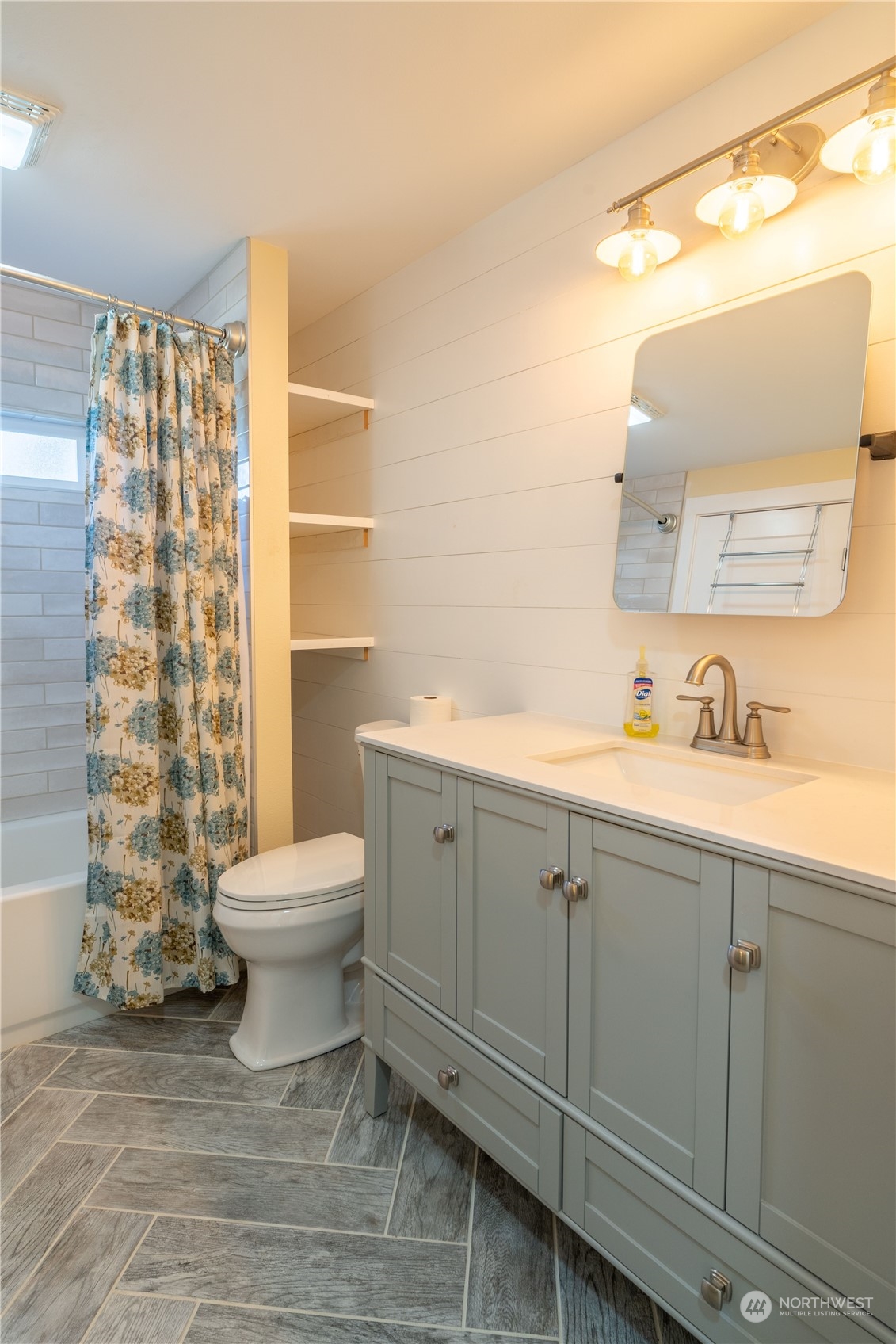 1963 Rd O Southeast Moses Lake, WA 98837 - Photo 16 of 18 a bathroom with a toilet a sink and mirror