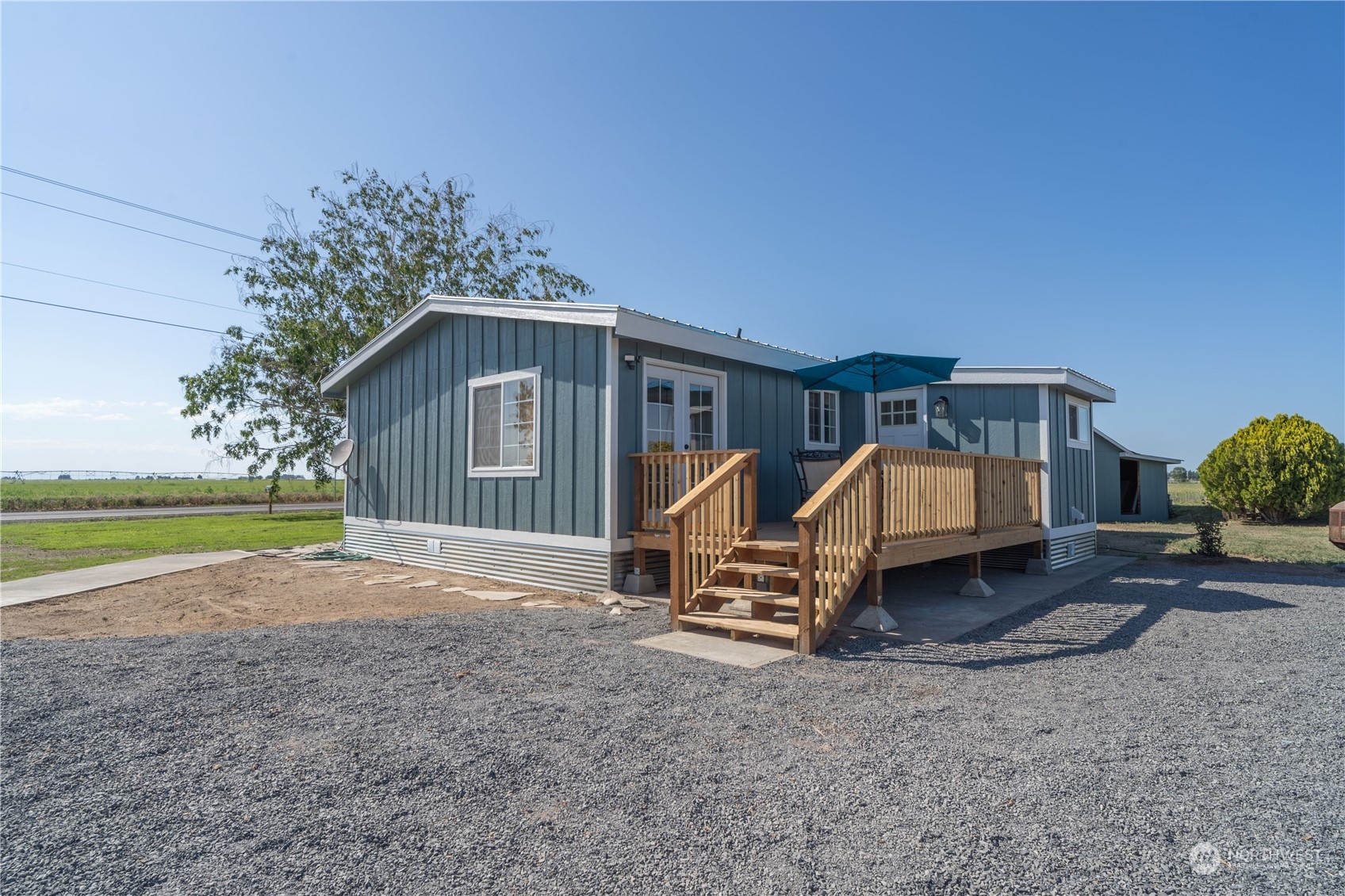 1963 Rd O Southeast Moses Lake, WA 98837 - Photo 5 of 18 a view of a house with backyard and patio