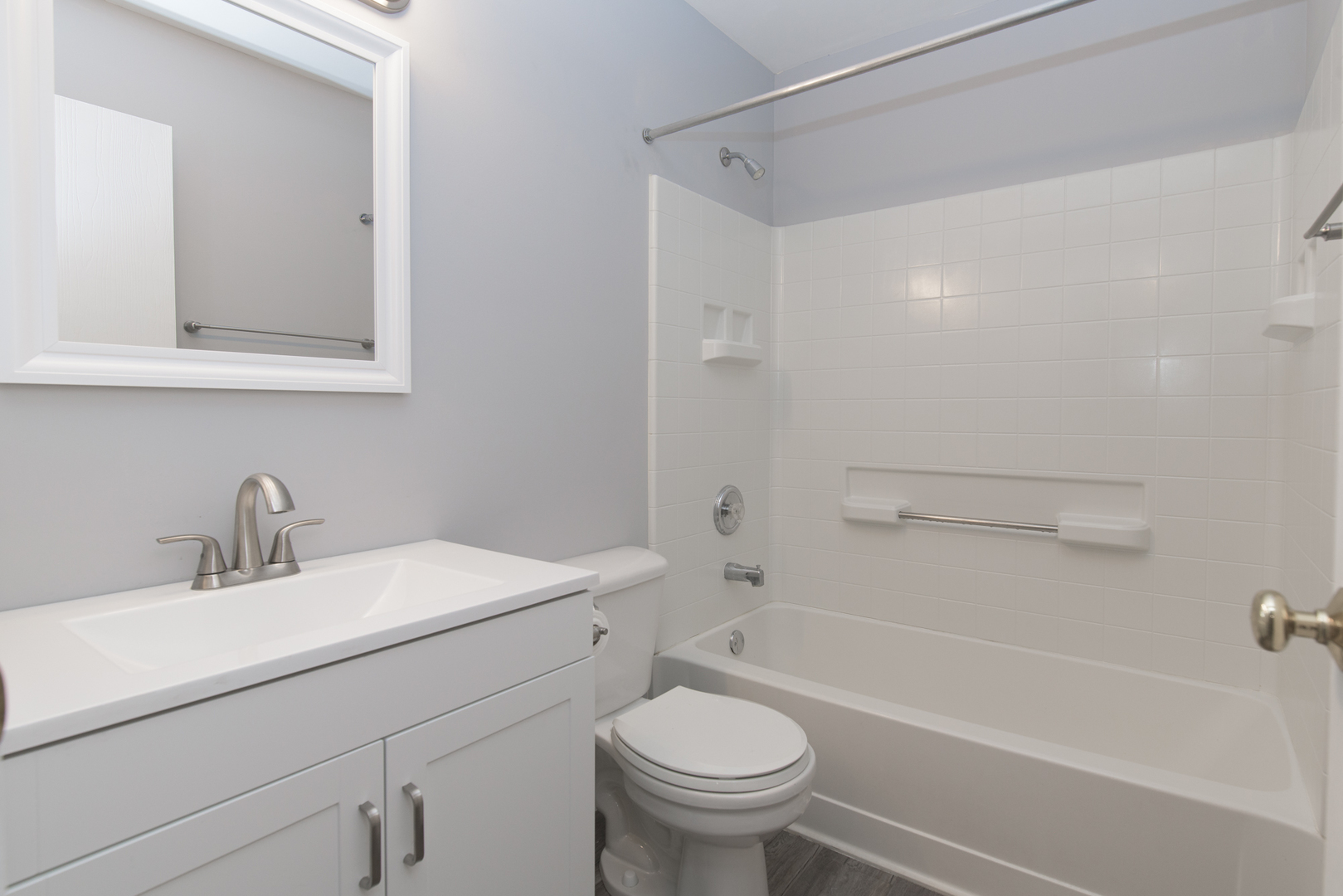 600 Indian Trail Road Antioch, IL 60002 - Photo 8 of 20 a bathroom with a sink toilet vanity and shower