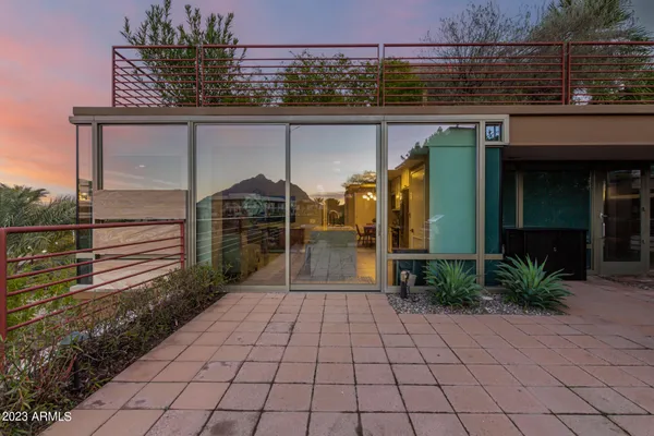 a backyard of a house with seating space