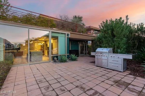 a view of a terrace with furniture