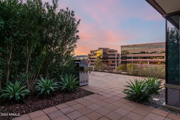 a view of a chairs and table in the terrace