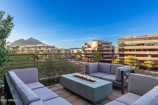 a view of a terrace with furniture