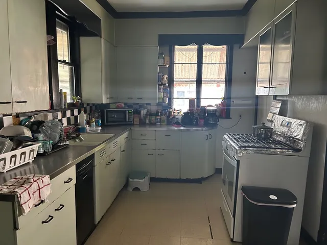 a room with sink and window