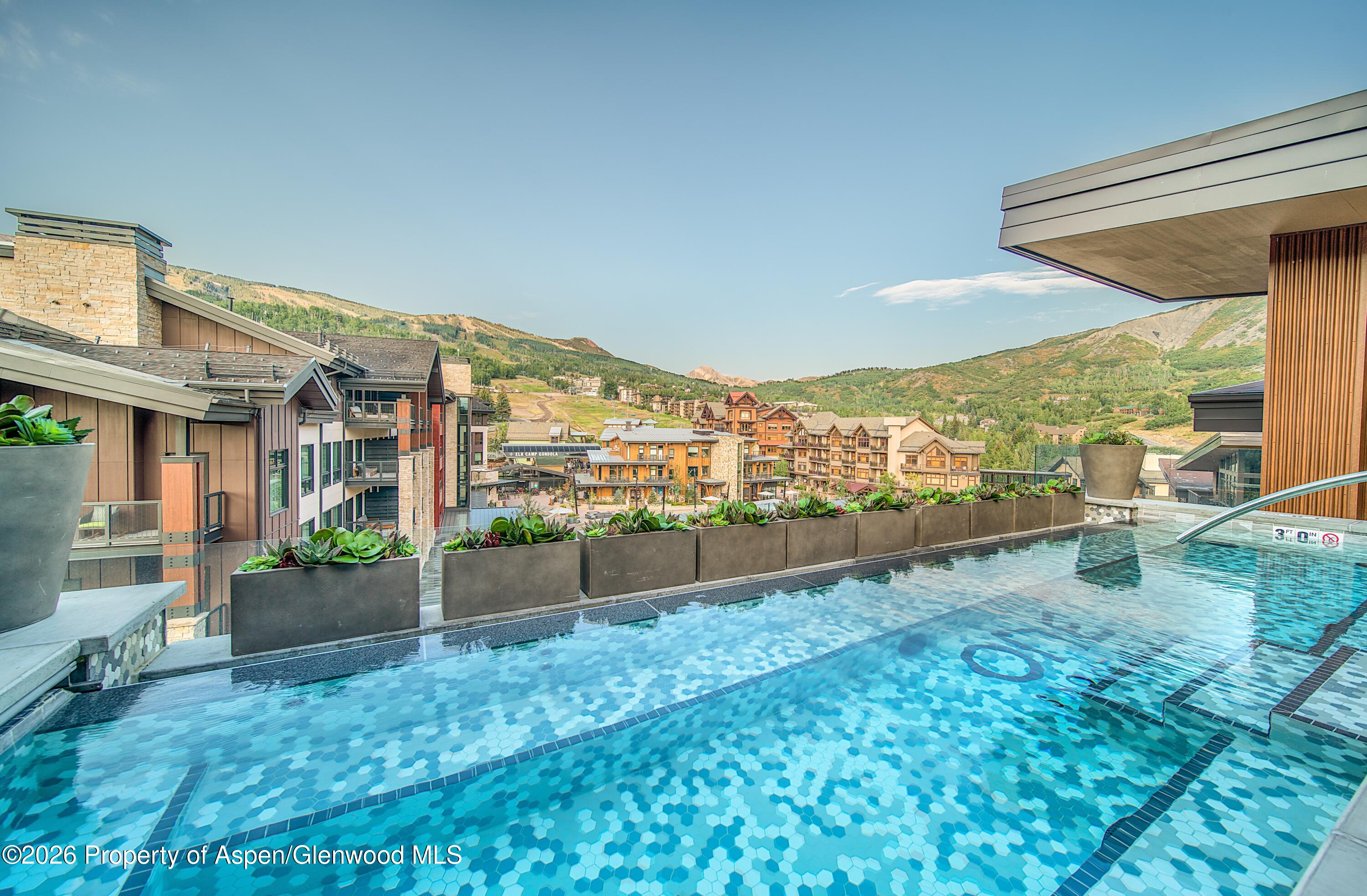 77 Wood Road, Unit 40701 Snowmass Village, CO 81615 - Photo 9 of 21 OSMRooftop-1