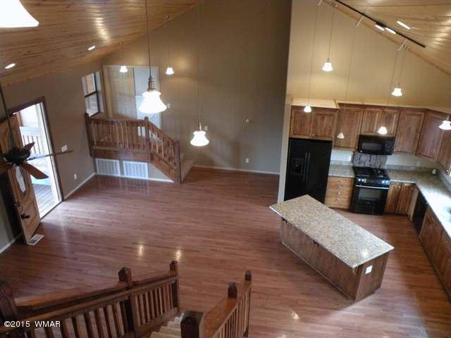 1851 Ansell Road Heber, AZ 85928 - Photo 8 of 24 a large living room with stainless steel appliances furniture