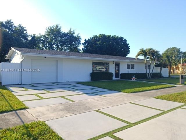 8123 Southwest 95th Court Miami, FL 33173 - Photo 4 of 5 a view of a house with a yard and large tree