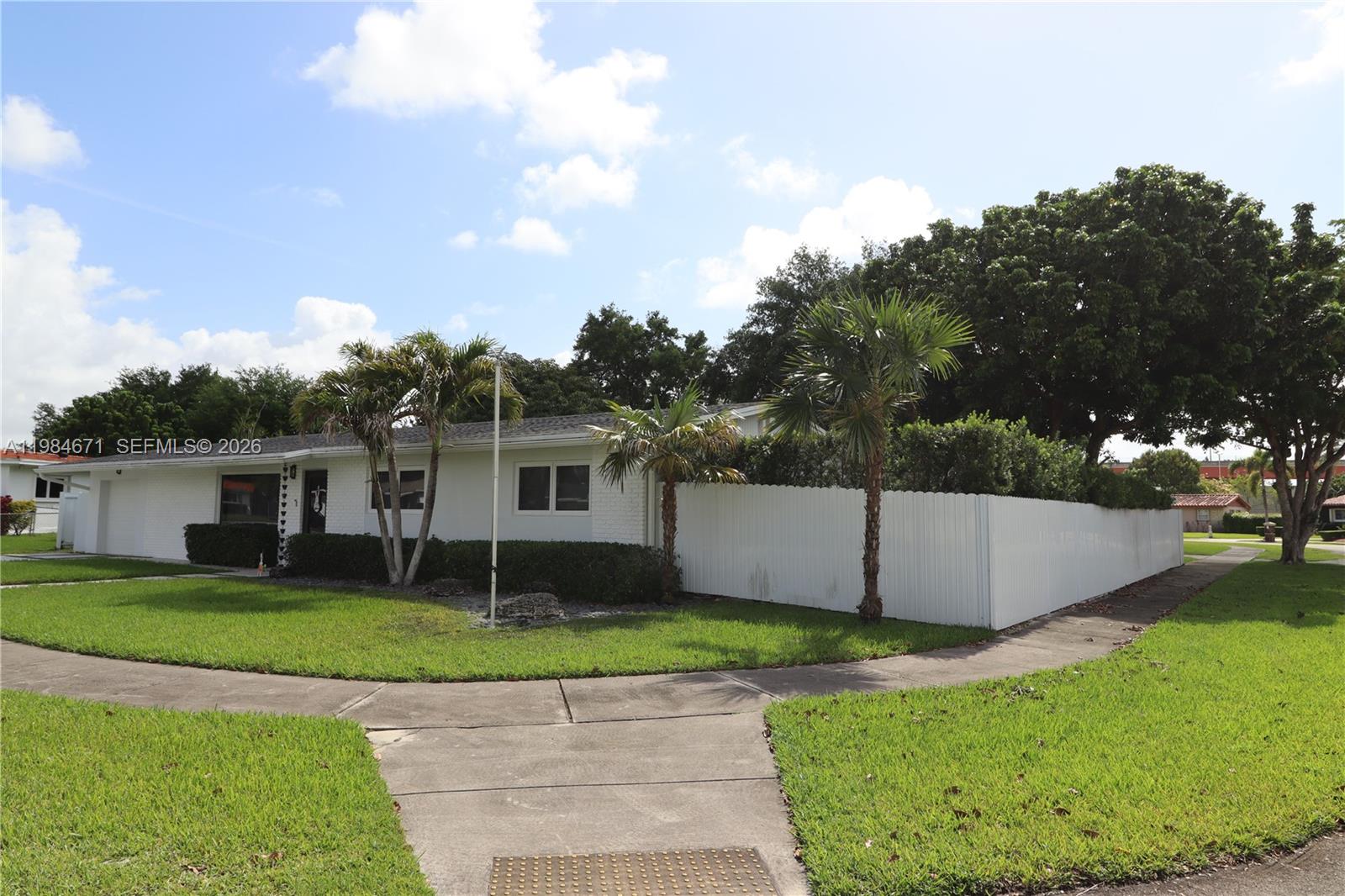 8123 Southwest 95th Court Miami, FL 33173 - Photo 5 of 5 a view of a backyard with a garden and plants
