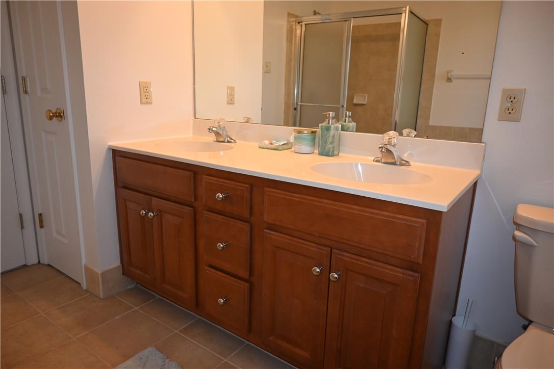 3829 East Hopewell Road Center Valley, PA 18034 - Photo 35 of 52 Double vanity with ample storage offers functional elegance in this bathing area.