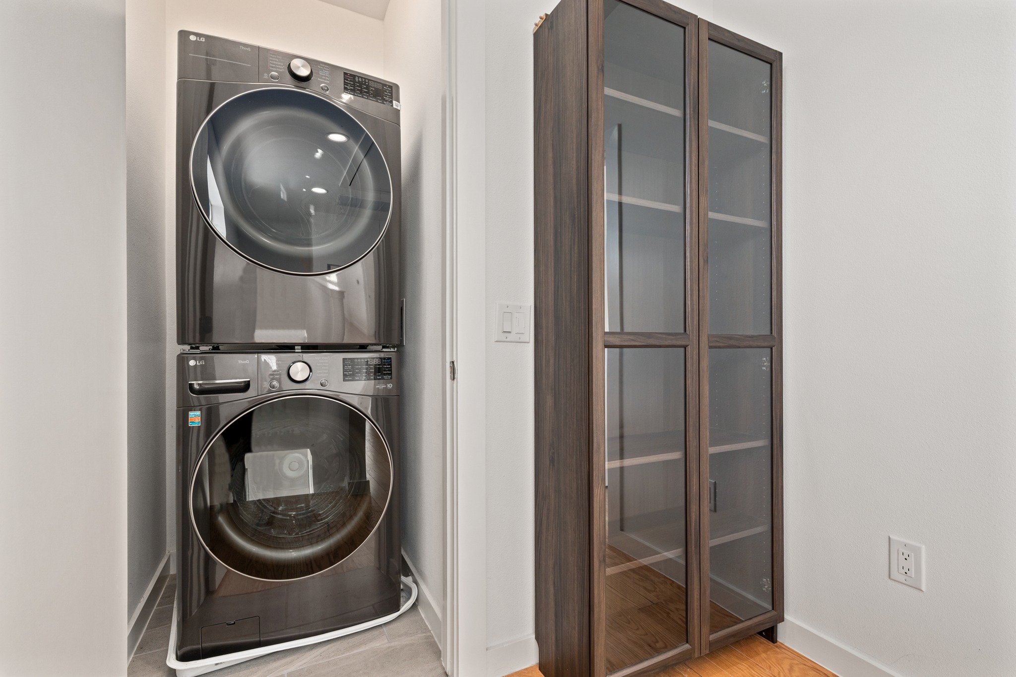 1190 Sarabeth Way Austin, TX 78721 - Photo 16 of 22 An efficient full sized stacked laundry closet on the upper level.