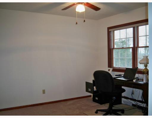 2660 Ridge Rd Extension Economy, PA 15005 - Photo 5 of 18 Den/Family/Great Room. Built as a 1st floor bedroom, this 12 x 18 room features double closet, double window & ceiling fan. New carpet. Would make an excellent office, 5th bedroom, exercise room