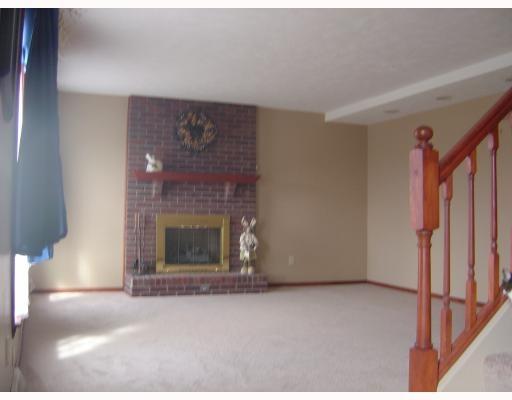 2660 Ridge Rd Extension Economy, PA 15005 - Photo 10 of 18 Living Room. Another angle of the living room....recessed lights along back wall (at right of fireplace)....see how big!