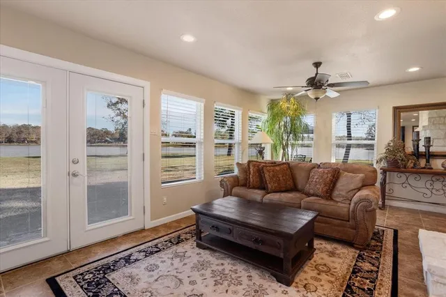 a living room with furniture and a window