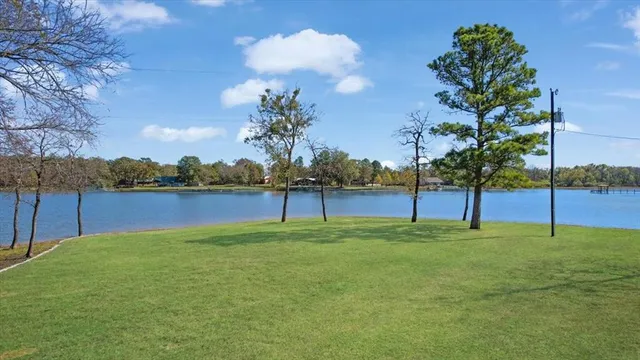a view of a house with a big yard