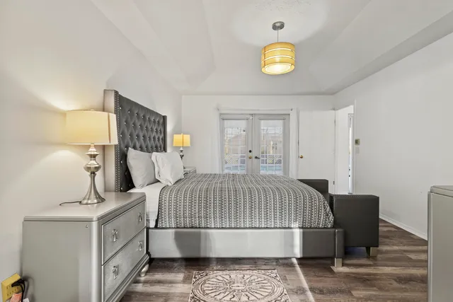 a bathroom with a sink a vanity and a mirror