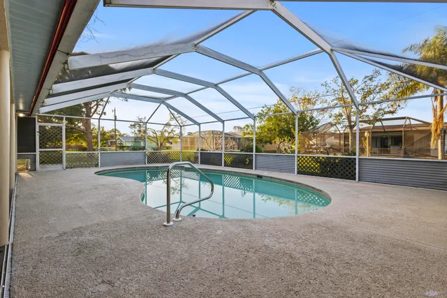 a dining room with furniture and windows