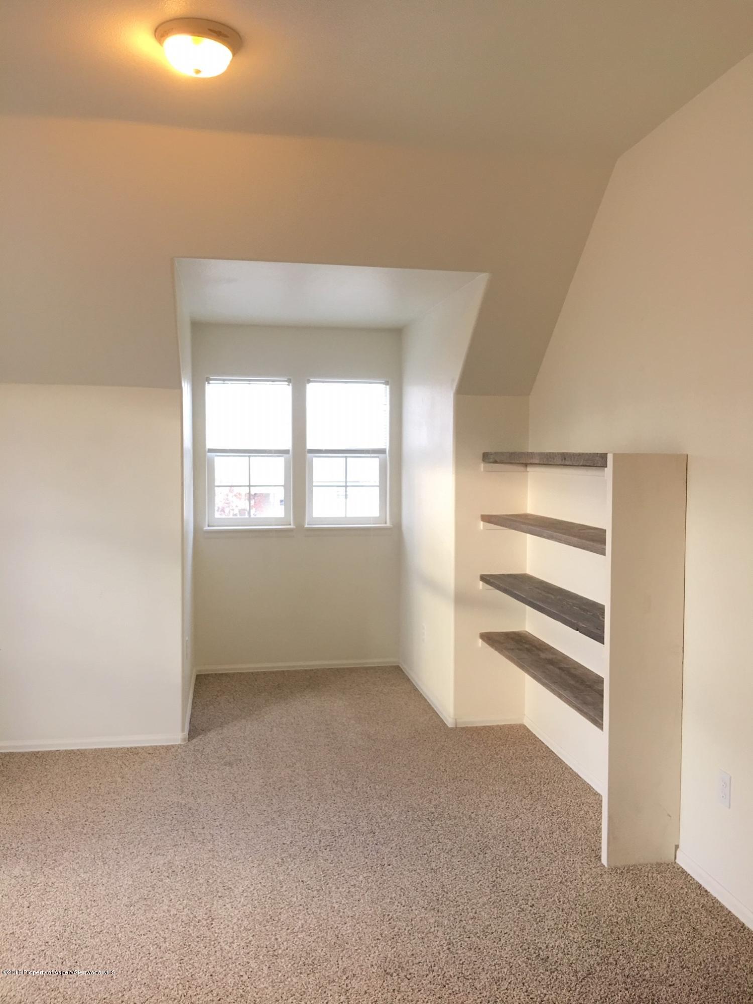 445 Evergreen Drive Rifle, CO 81650 - Photo 11 of 16 bed room 3 shelves