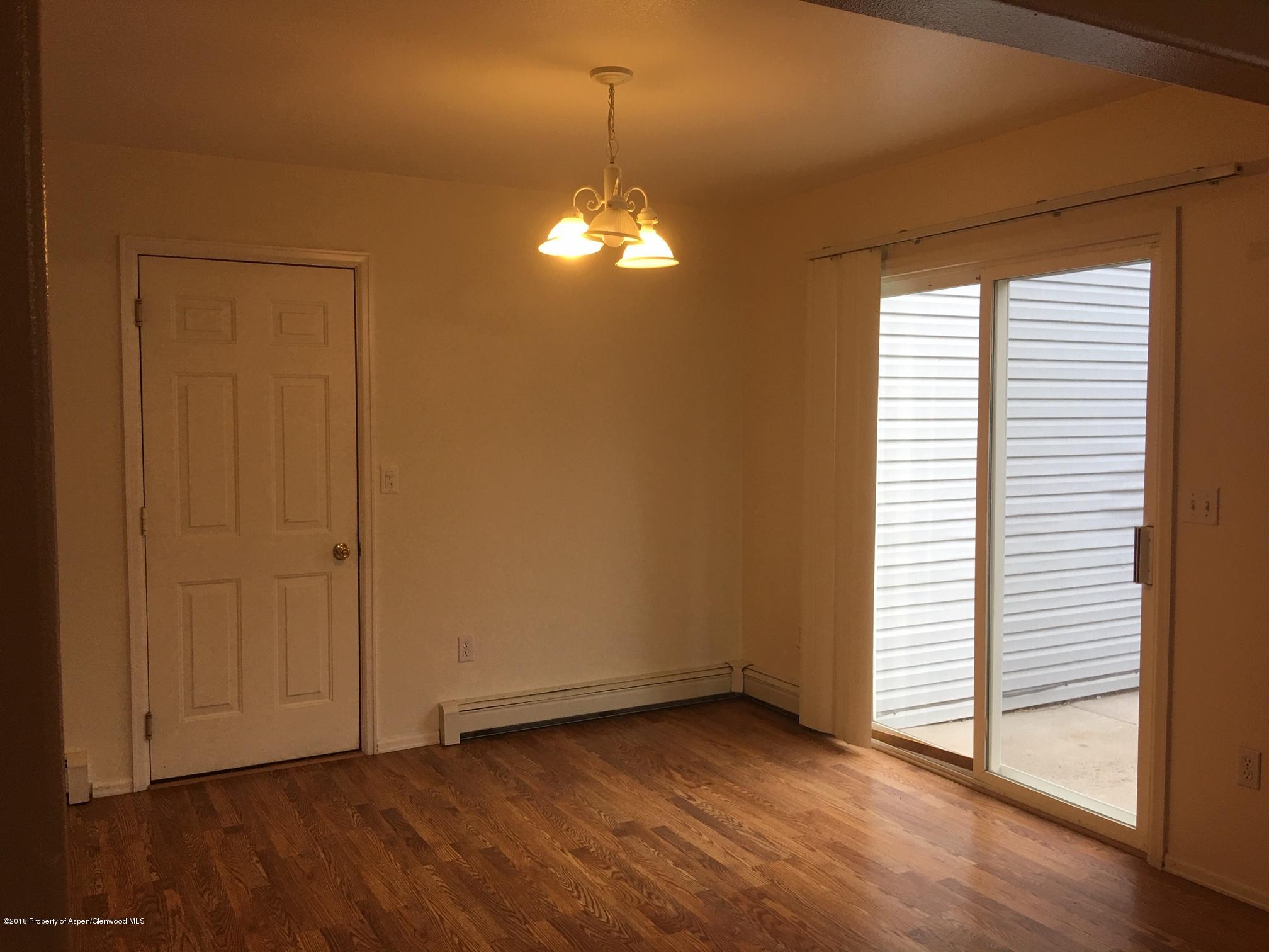 445 Evergreen Drive Rifle, CO 81650 - Photo 6 of 16 Dining room to patio