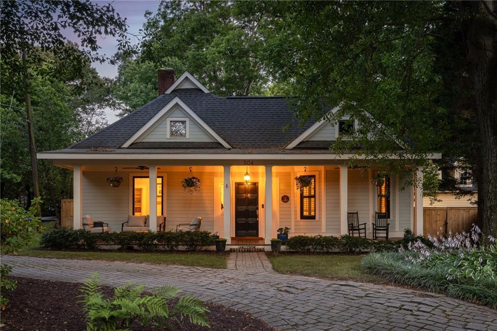 504 West Pharr Road Decatur, GA 30030 - Photo 1 of 1 a front view of a house with garden
