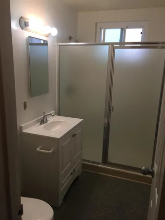 a bathroom with a sink and mirror