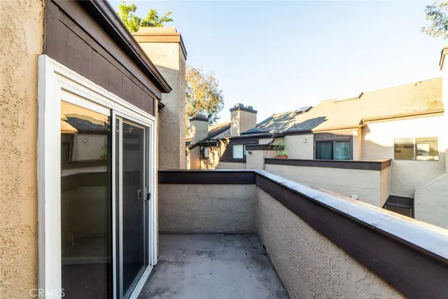 a balcony with a street view