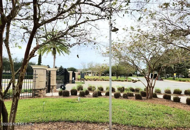 a view of a lake view with a big yard