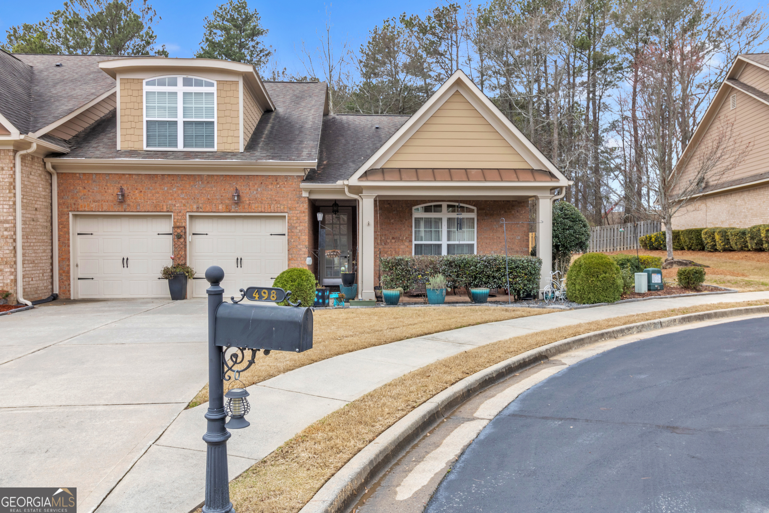 498 Townsend Street Grayson, GA 30017 - Photo 1 of 1 a front view of a house with a yard and garage