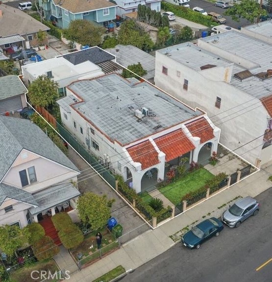 1213 West 24th Street Los Angeles, CA 90007 - Photo 10 of 11 an aerial view of residential houses with outdoor space